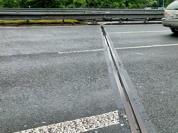 istock expansion joint or movement joint while safely absorbing thermal expansion and contraction of building materials and vibrations to allow movement due to ground settlement or seismic activity. 2217759725