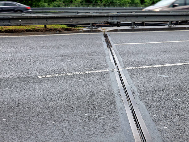 istock expansion joint or movement joint while safely absorbing thermal expansion and contraction of building materials and vibrations to allow movement due to ground settlement or seismic activity. 2217759730