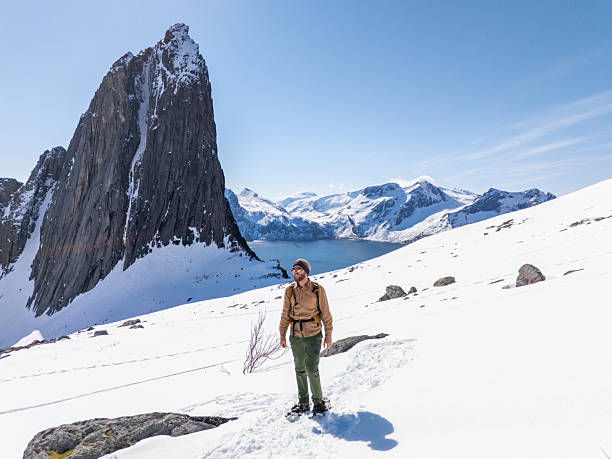 istock Hiker in Snowy Mountain Landscape with Scenic Backdrop 2217759885