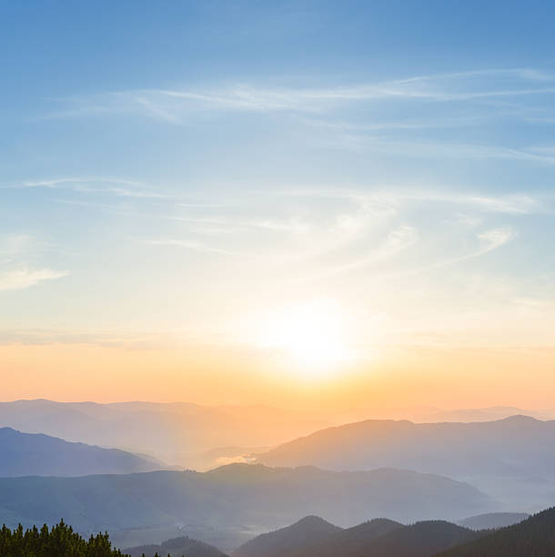 istock mountain silhouette in blue mist at the sunrise 2217763252