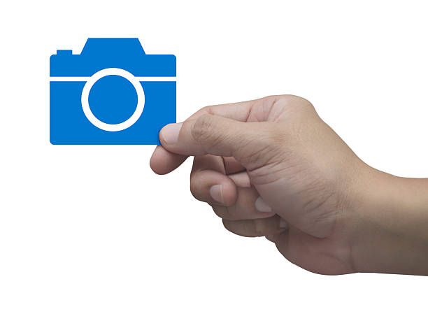 Hand holding camera flat icon in fingers isolated on white background, Business camera service shop online concept