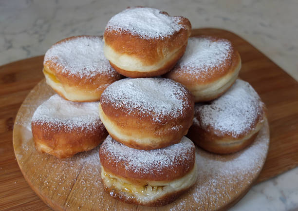 istock Traditional German or Austrian fried donuts with no hole, so called Krapfen, Berliner or Pfannkuchen 2217777876