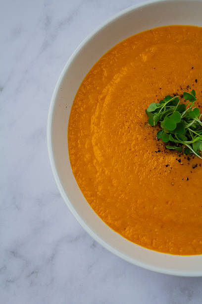 istock Homemade Carrot Soup in a Rustic Bowl 2217778331