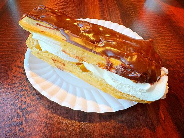 Freshly baked Chocolate covered cream filled eclair