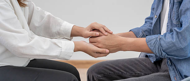 istock hold hand support each while discussing family issues. doctor encourages and empathy woman suffers depression. psychological, save divorce, Hand in hand together, trust, care 2217779947