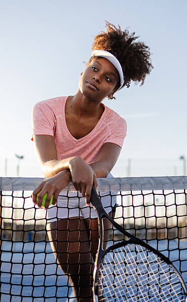 istock Tennis player resting after training on a sunny day 2217781817
