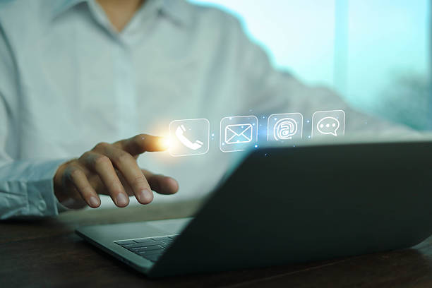 istock Contact customer support. Businessman points finger at icon (address, phone, email, call) help from mail websites. mobile communication contact service digital technology, Provide assistance 2217782288