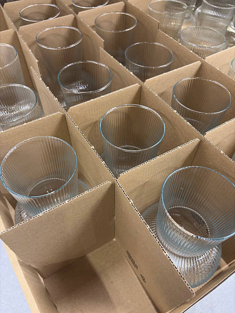 Glass bottles in a cardboard box with partitions for transporting broken items