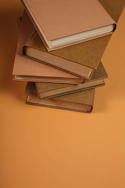 istock Open book, hardback colorful books on table. Back to school. Copy space for text. Education business concept 2217790452