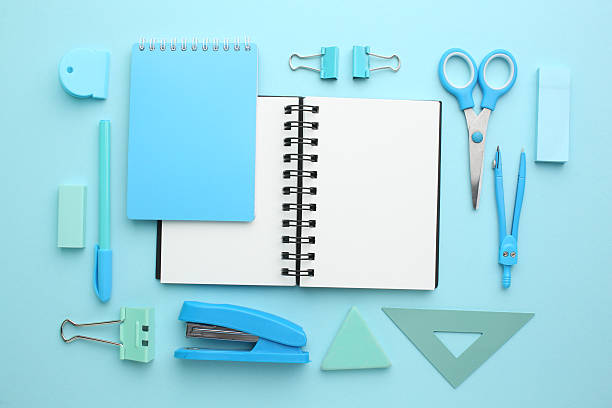 istock Stationery calculator ruler calculator and school stuff on coloured background. Concept of school and college learning 2217790856