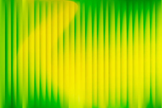 istock Abstract green, yellow stripped gradient background, glowing fractal glass backdrop. Elegant fluid blur texture with iridescent neon lights for presentation, poster, product display 2217790969