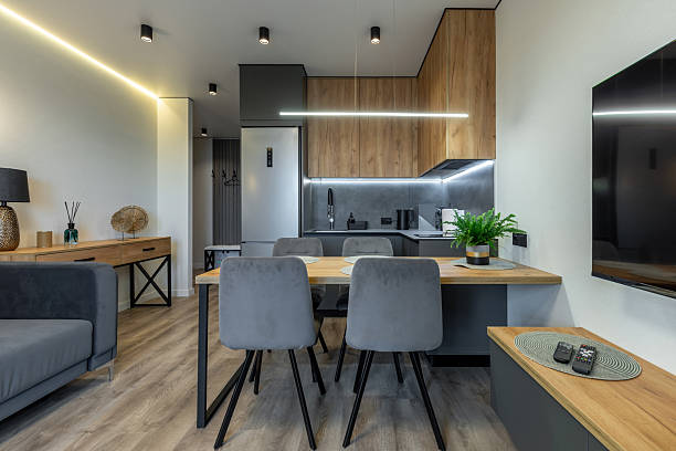 istock Cozy Open Kitchen and Living Room with Wooden Elements 2217793099