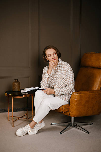 istock Psychologist Sitting Thoughtfully In Chair 2217796231