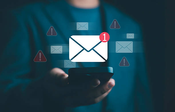 istock New email notification concept, business online communication, email communication, digital marketing, businessman responding to floating digital interface showing new email notification symbol. 2217800099