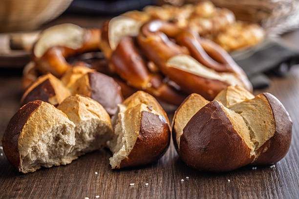 istock Crunchy bavarian buns on wooden table. 2217808037