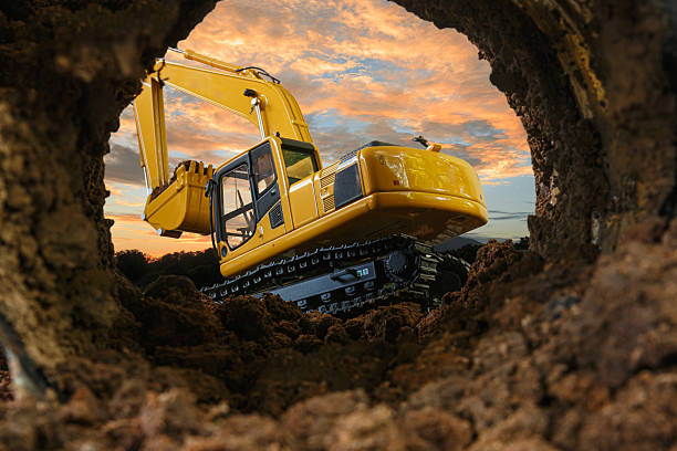 istock Crawler excavator are digging soil in the tunnel construction site. 2217810962