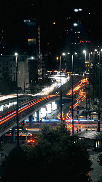 istock Night city traffic timelapse light lines 2217811003