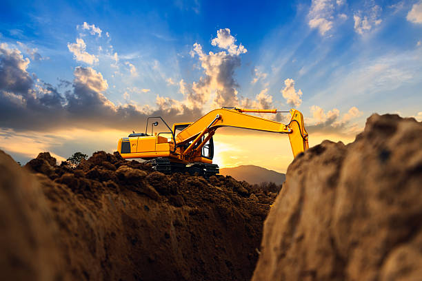 istock Crawler excavator  are digging  soil in the construction site . 2217811040