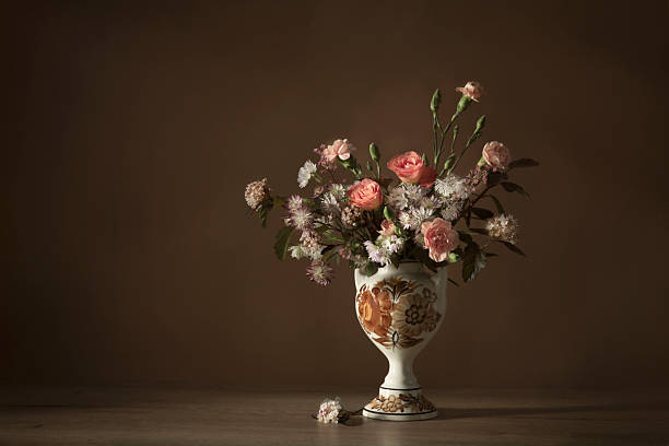 istock summer flowers in vintage ceramic vase on dark background 2217815959