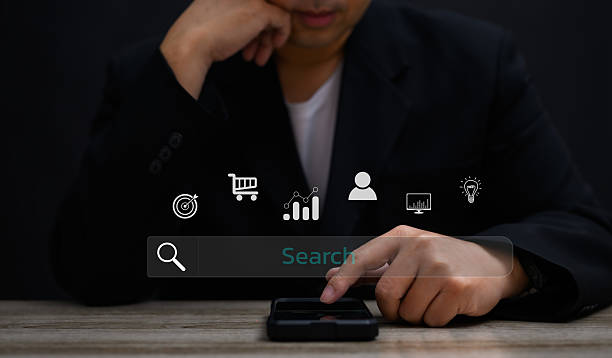istock Concept Search engine for website : Businessman using finger on virtual screen for Search news , information , technology , data , media , stock etc 2217816169