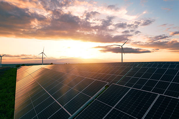 istock Wind turbines and solar parks are two adopted renewable energy technologies used to generate electricity sustainably.Green energy reduces pollution and keeps the environment clean and sustainable 2217824962