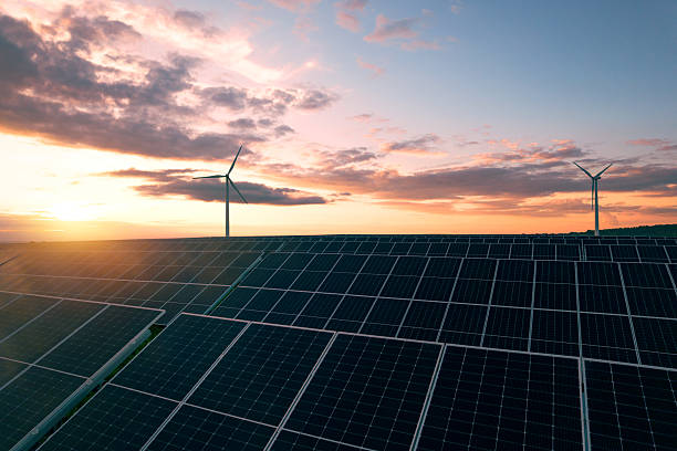 istock Wind turbines and solar parks are two adopted renewable energy technologies used to generate electricity sustainably.Green energy reduces pollution and keeps the environment clean and sustainable 2217824967