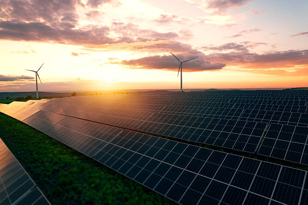 istock Wind turbines and solar parks are two adopted renewable energy technologies used to generate electricity sustainably.Green energy reduces pollution and keeps the environment clean and sustainable 2217824977
