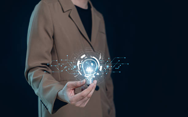 istock Hand of  holding illuminated light bulb, Idea innovation and inspiration concept.  creativity with bulbs that shine glitter, Concept for success. 2217827450