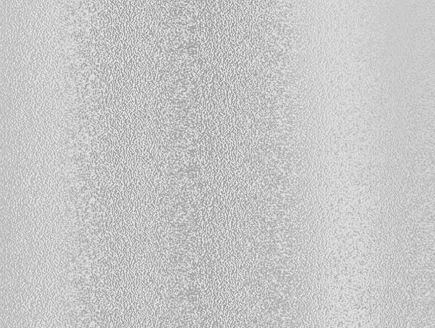 istock gray foil glass texture background. Abstract gradient bright light reflection and shiny rough texture surface. metal texture background 2217828528