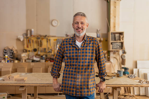 istock Happy Craftsman Posing in a Woodworking Shop 2217828558