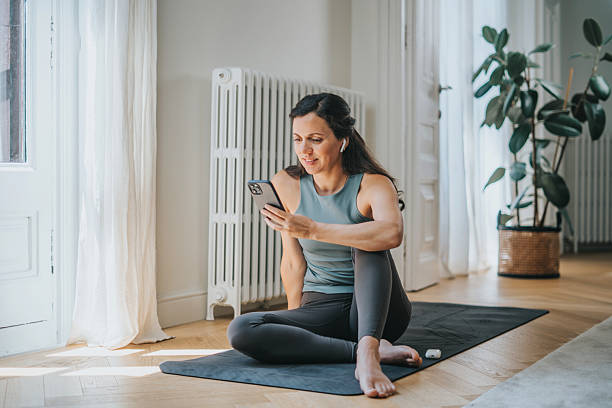 istock Woman on her yoga practice at home 2217831299