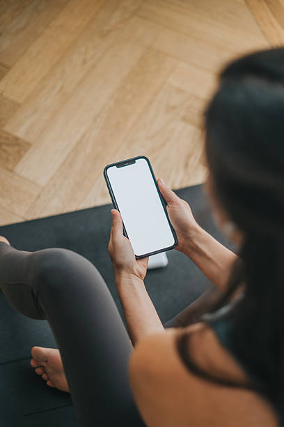 istock Woman on her yoga practice at home 2217831479