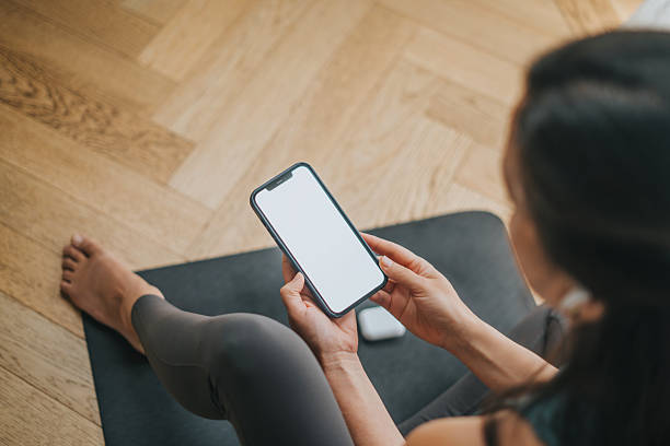 istock Woman on her yoga practice at home 2217831480