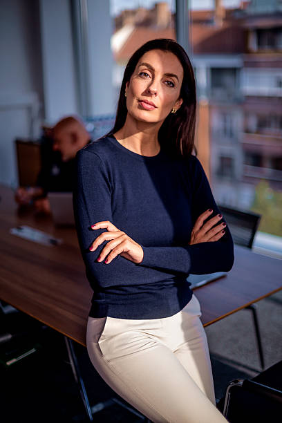 istock Caucasian woman standing in a modern office 2217832714