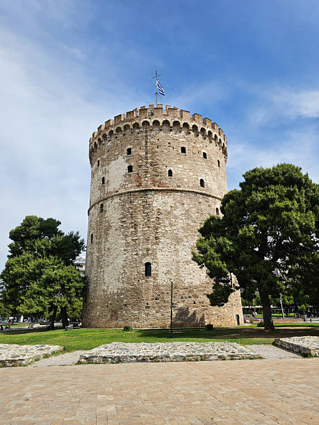 istock White Tower stands tall in Thessaloniki under bright blue sky and greenery on a sunny afternoon 2217832906