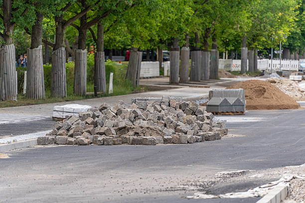 Construction site material with paving stones and sand.
