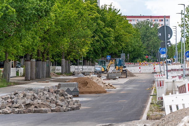 istock Road Construction Site with Machinery and Barriers. 2217836706