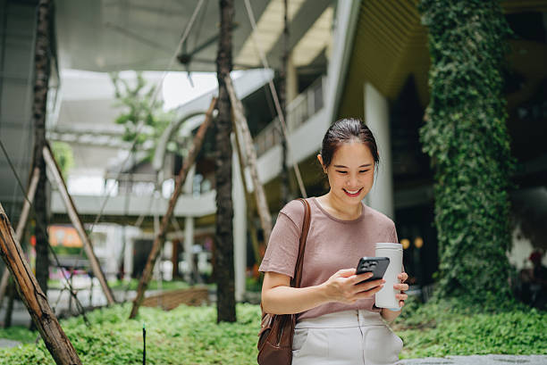 istock Holding Cell Phone and Chatting in Social Media 2217838758