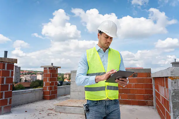 Drone inspecting residential roof