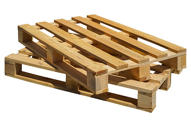 istock Stacked Wooden Pallets isolated white background. 2217840595