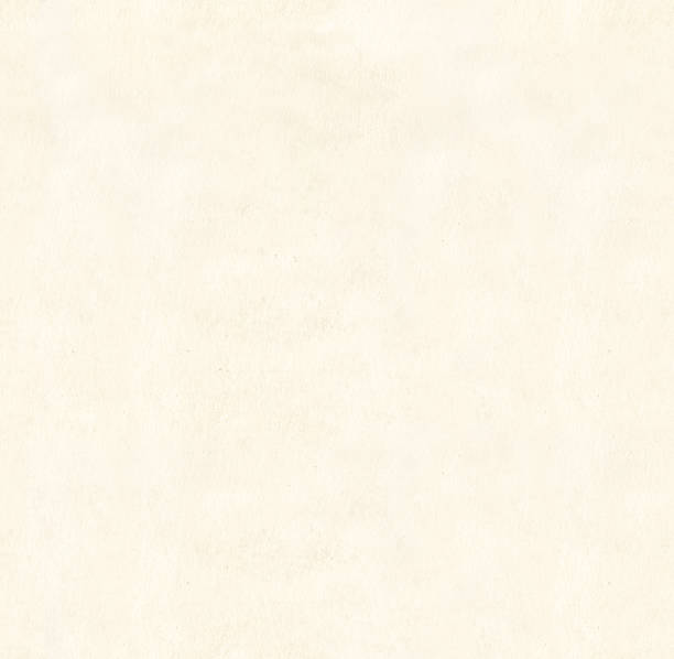 istock Seamless background with retro paper of light beige color. Repeatable pattern with old cardboard texture of ivory color. Endless texture can be used for tiling pattern fills, web page background 2217848152