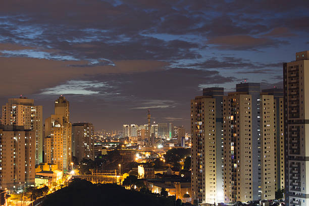 istock Cloudy horizon on big city at night 2217851482