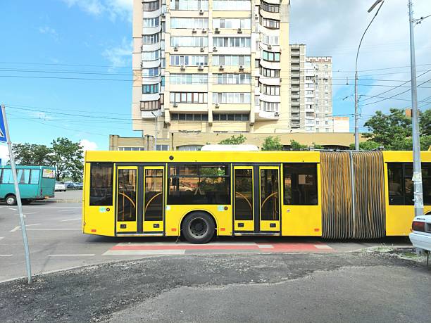 Kyiv, Ukraine - May 30 2025: yellow bus on a city street