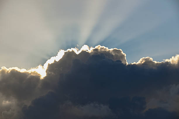 istock Beautiful evening sunset with clouds and sun rays 2217858758