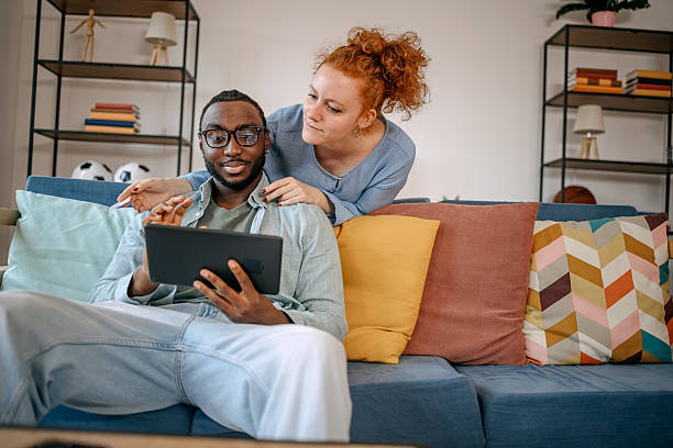 istock People using credit card for online shopping at home 2217860883
