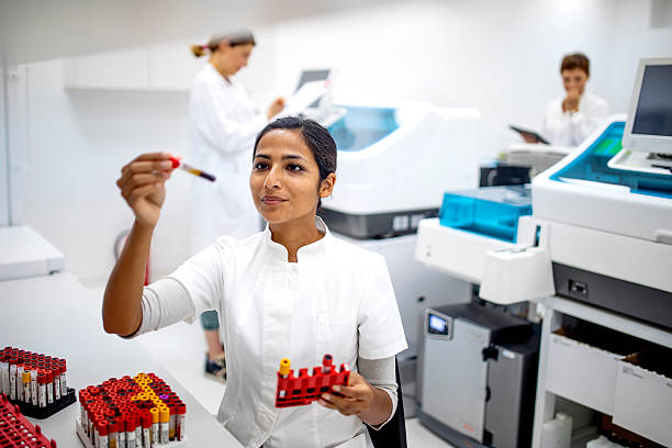istock Young Medical Researcher Examining Blood Samples In Modern Clinical Laboratory With White Uniform 2217864076