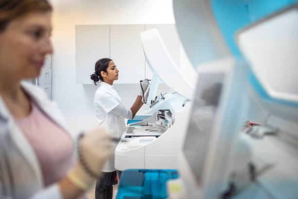 istock Focused Young Indian Female Lab Professional in Bright Clinical Laboratory Setting 2217864460