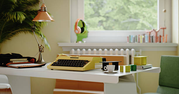 istock Yellow Retro Typewriter on Minimal White Desk in Sunny Office 2217867557