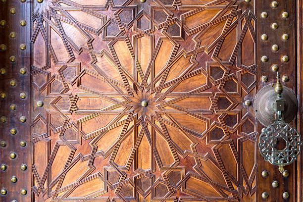 istock Intricately Carved Wooden Door with Geometric Patterns 2217870741
