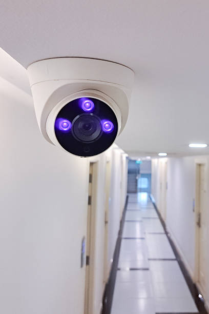 istock Surveillance Video Camera  wireless CCTV security system.Modern technology and equipment.Surveillance camera on the ceiling for security inside the building. 2217872469